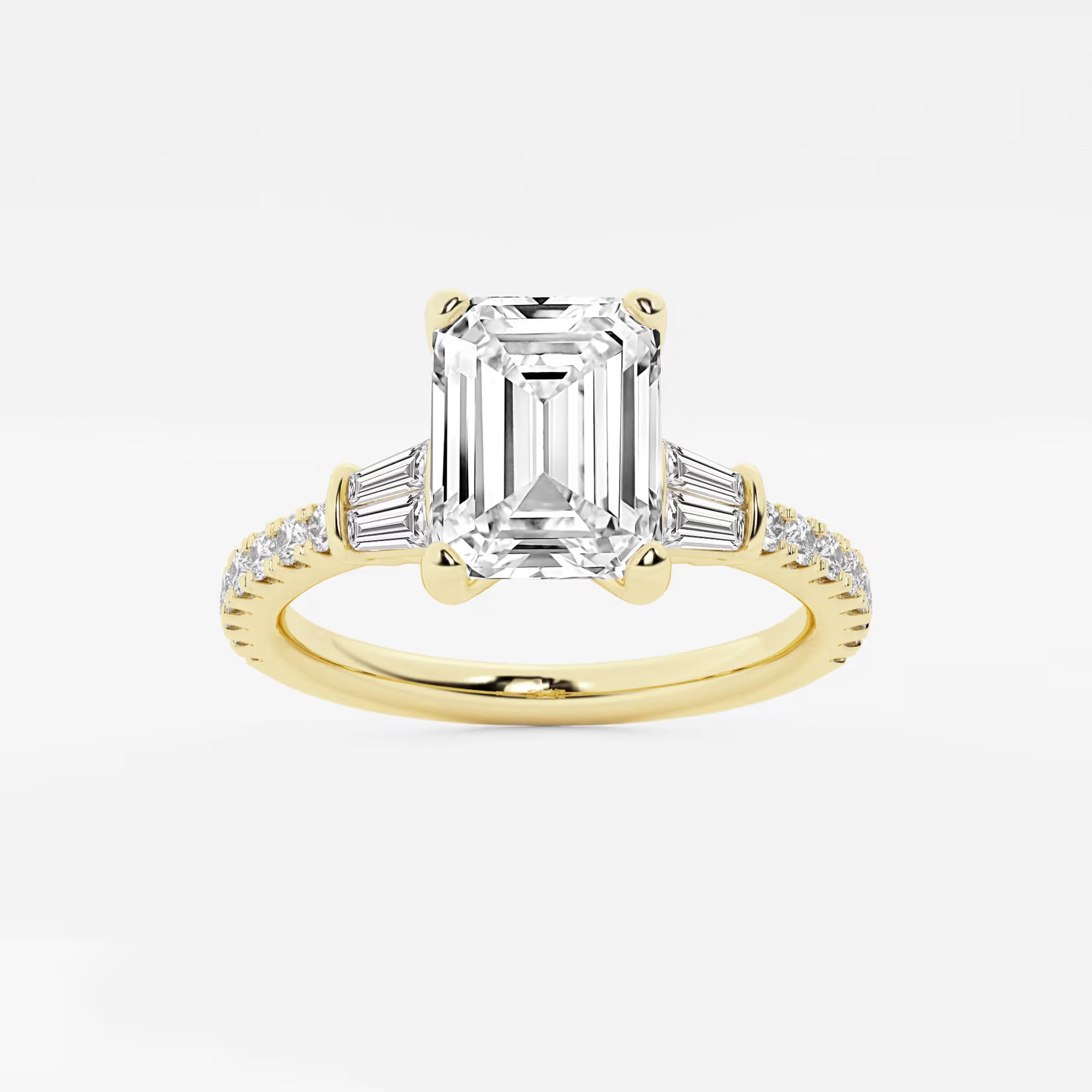Emerald Cut Three-Stone Engagement Ring